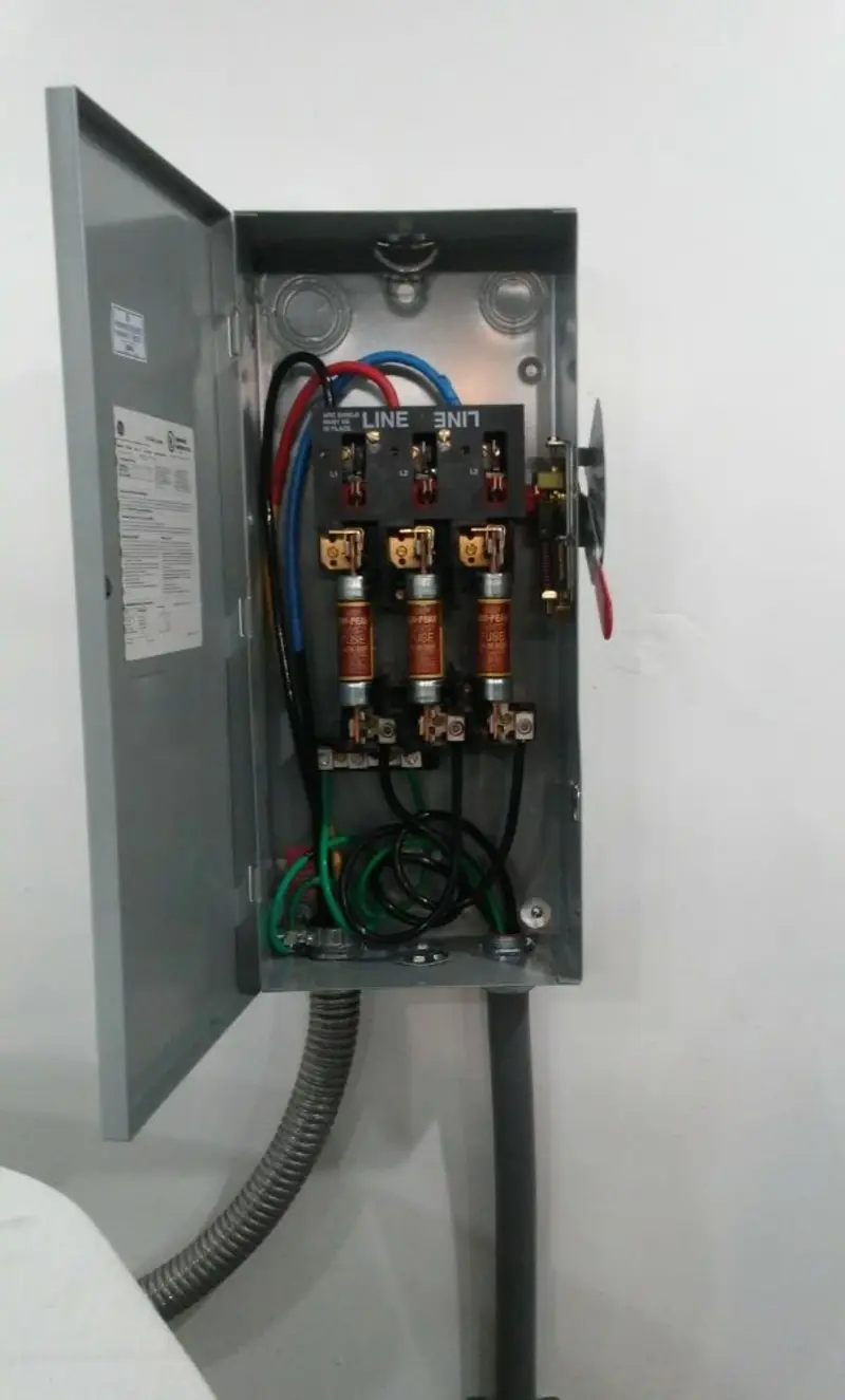 Three-phase disconnect switch installed for Smoke Detector Installation in Houston